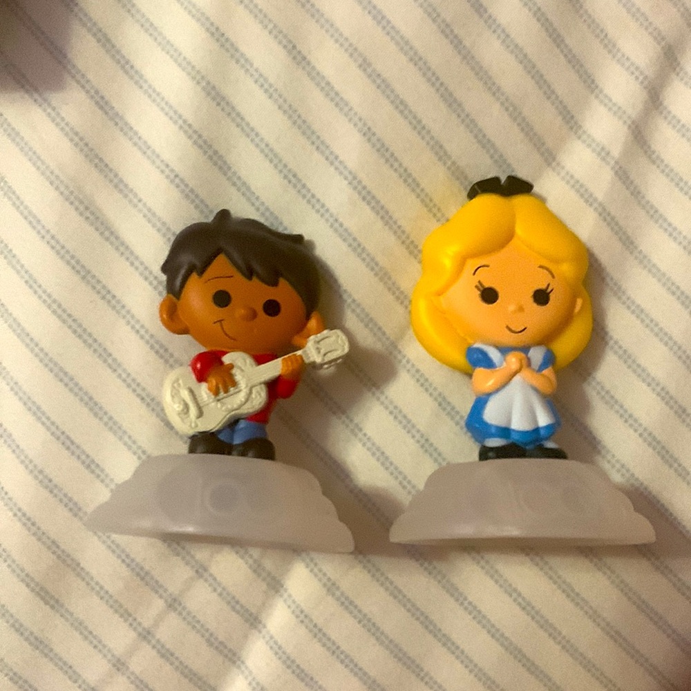 McDonald’s happy meal toy Disney Alice and Miguel figure